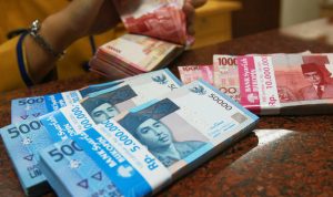 Nilai Tukar Rupiah Menguat pada Awal Perdagangan, Pasar Waspada Kebijakan The Fed