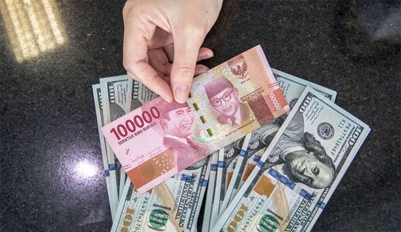 Nilai Tukar Rupiah Melemah Terhadap Dolar AS Akibat Sikap Kurang Dovish dari The Fed