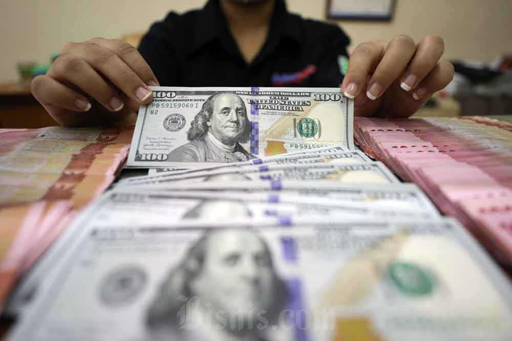 Nilai Tukar Rupiah Terhadap Dolar AS Naik Tipis pada Selasa Pagi