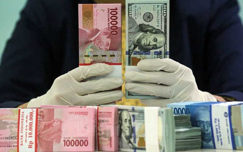 Rupiah Melemah Jelang Awal Pekan, Sentimen Terhadap Kebijakan Suku Bunga AS Mempengaruhi