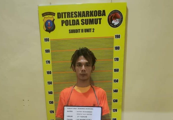 Pelaku diamankan petugas kepolisian.(Istimewa)