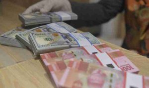 Rupiah Berpotensi Melemah Terhadap Dolar AS Akibat Konflik di Timur Tengah