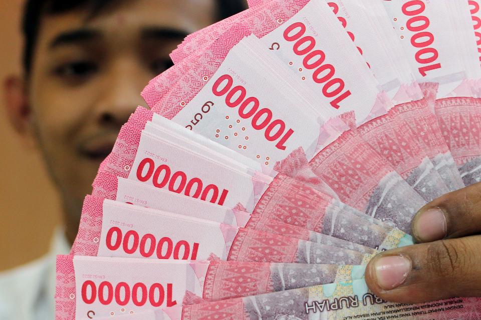 Rupiah Melemah Terhadap Dolar AS Jelang Akhir Pekan