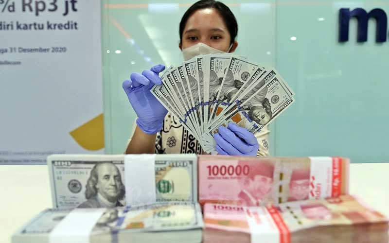 Rupiah Menguat Terhadap Dolar AS Berkat Surplus Neraca Perdagangan RI
