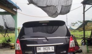 Mobil. Dinas BK-1625 L milik PUD Pasar Medan. BP/ist