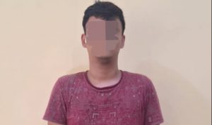 Pelaku yang diamankan petugas kepolisian.(Istimewa)