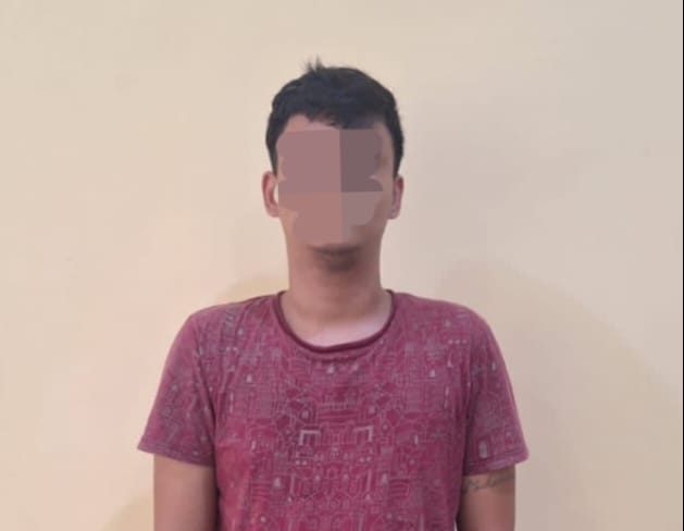 Pelaku yang diamankan petugas kepolisian.(Istimewa)
