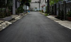 Jalan Eka Warni IX, Kecamatan Medan Johor, terlihat mulus setelah diperbaiki. BP/erwan