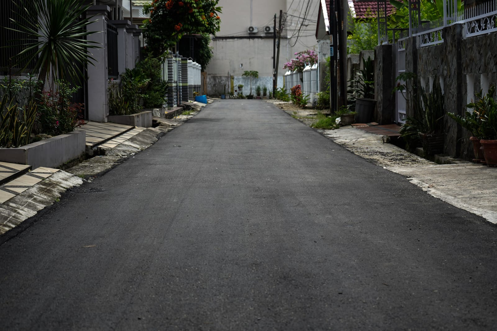 Jalan Eka Warni IX, Kecamatan Medan Johor, terlihat mulus setelah diperbaiki. BP/erwan