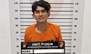 Pelaku MAJ saat diamankan di kantor polisi. (Foto: Dok. Polrestabes Medan).