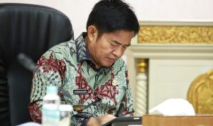 Foto: Pj Gubsu Hassanudin Melaporkan pelaksanaan intervensi stunting kepada menteri koordinator (menko). (Dok. Instagram pribadi Hassanudin)