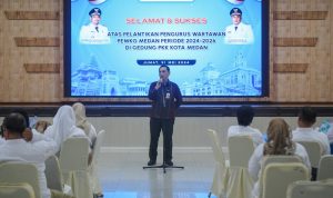 Wali Kota Medan Bobby Nasution diwakili Kadis Kominfo Medan Arrahman Pane saat memberikqn sambutan. BP/erwan