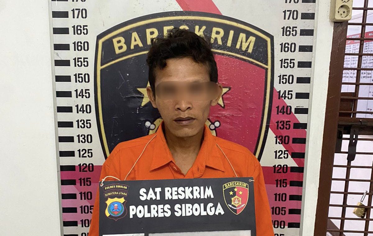 pelaku yang diamankan petugas kepolisian.(Istimewa)