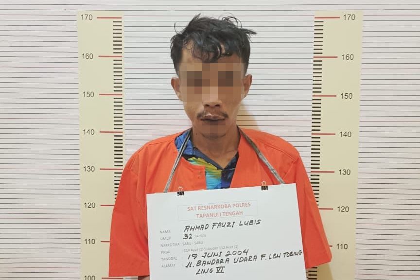 Pelaku ketika diamankan petugas kepolisian.(Istimewa).