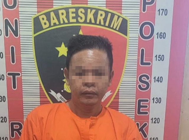 Pelaku diamankan petugas kepolisian.(Istimewa).
