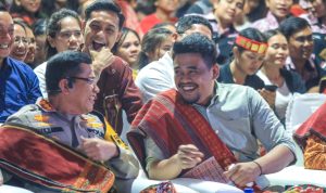 Wali Kota Medan Bobby Nasution saat menghadiri Pesta Gondang Naposo di Taman Tugu Pahlawan Jalan Sisingamangaraja Medan, Sabtu (29/6/2024) malam. (BP/erwan