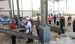 Bidang Venue PB PON bersama Wali Kota Pematangsiantar serta Pemkot Pematangsiantar meninjau pengerjaan venue cabang olahraga tinju di Pematangsiantar.