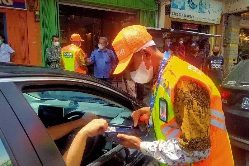 Salah satu jukir di Kota Medan. BP/erwan
