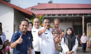 Wali Kota Binjai bersama Kadis Pertanian Kota Binjai dalam peninjauan penyaluran beras cadangan pangan pemerintah (CPP). 
