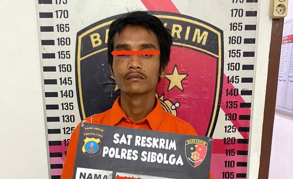 Pelaku yang diamankan petugas kepolisian.(Istimewa)