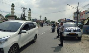 Personel Satlantas Polresta Deli Serdang mengimbau kepada pengendara untuk tertib berlalulintas.(Istimewa).