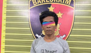 Pelaku yang diamankan petugas kepolisian.(Istimewa)