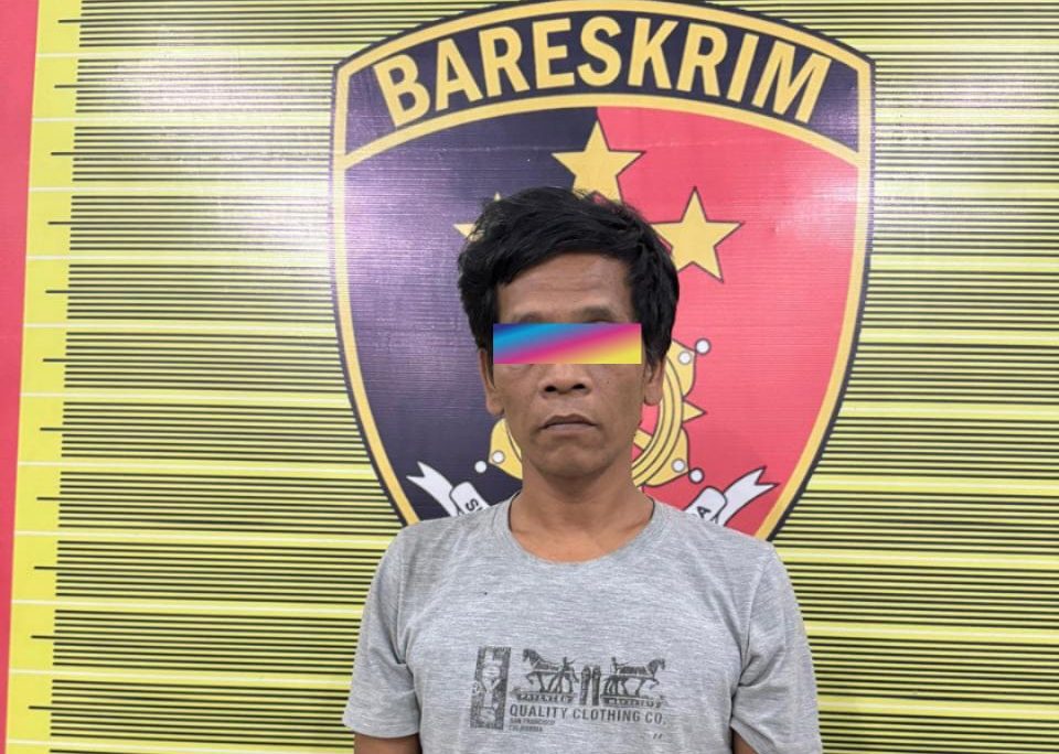 Pelaku yang diamankan petugas kepolisian.(Istimewa)
