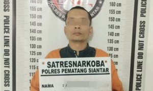 Pelaku yang diamankan petugas kepolisian.(Istimewa)