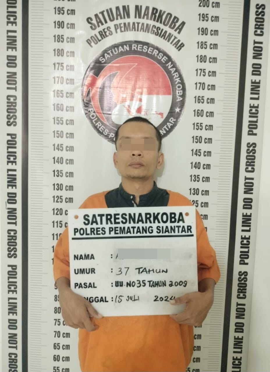 Pelaku yang diamankan petugas kepolisian.(Istimewa)