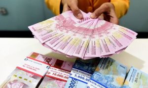 Nilai Tukar Rupiah Menguat, The Fed Beri Sinyal Pemangkasan Suku Bunga