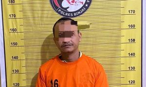 Pelaku yang diamankan petugas kepolisian.(Istimewa)