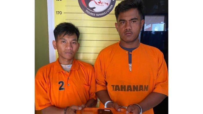 Kedua pelaku ketika diamankan petugas kepolisian.(Istimewa).