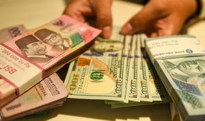 Nilai Tukar Rupiah Melemah Terhadap Dolar AS Rp15.610 per dolar AS