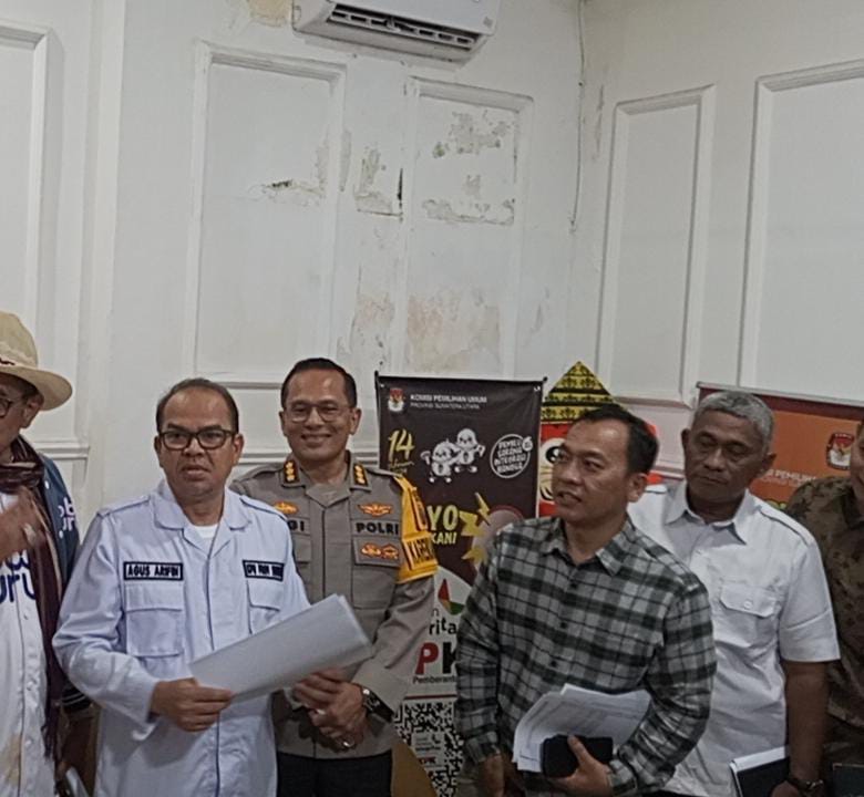Ketua KPU Sumut Agus Arifin dan Karo Operasional Polda Sumut Kombes Togi.(Istimewa).