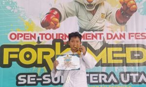 Karateka cilik Izat enak bulan latihan raih medali emas. BP/erwan