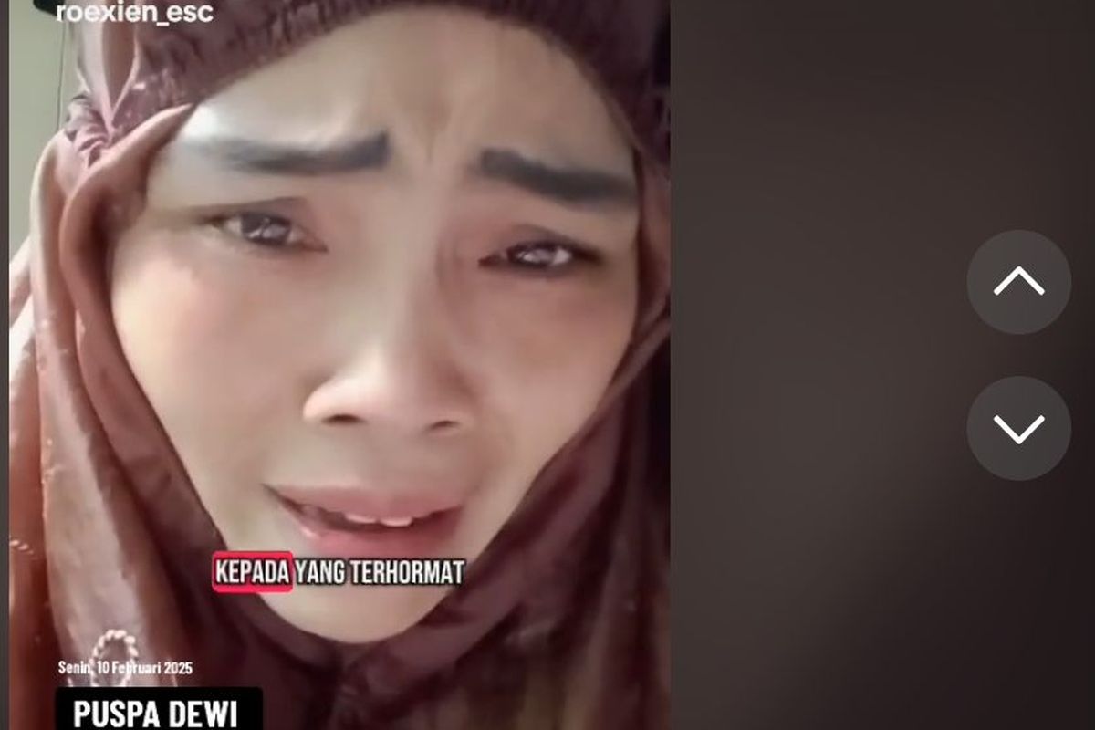 Puspa Dewi TKI asal kota Prabumulih, Sumatera Selatan yang bekerja di Singapura menangis minta pulang ke Indonesia.
