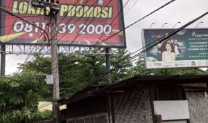 Papan Reklame Raksasa di Jalan Guru Patimpus diduga tidak memiliki izin.(harianbatakpos).