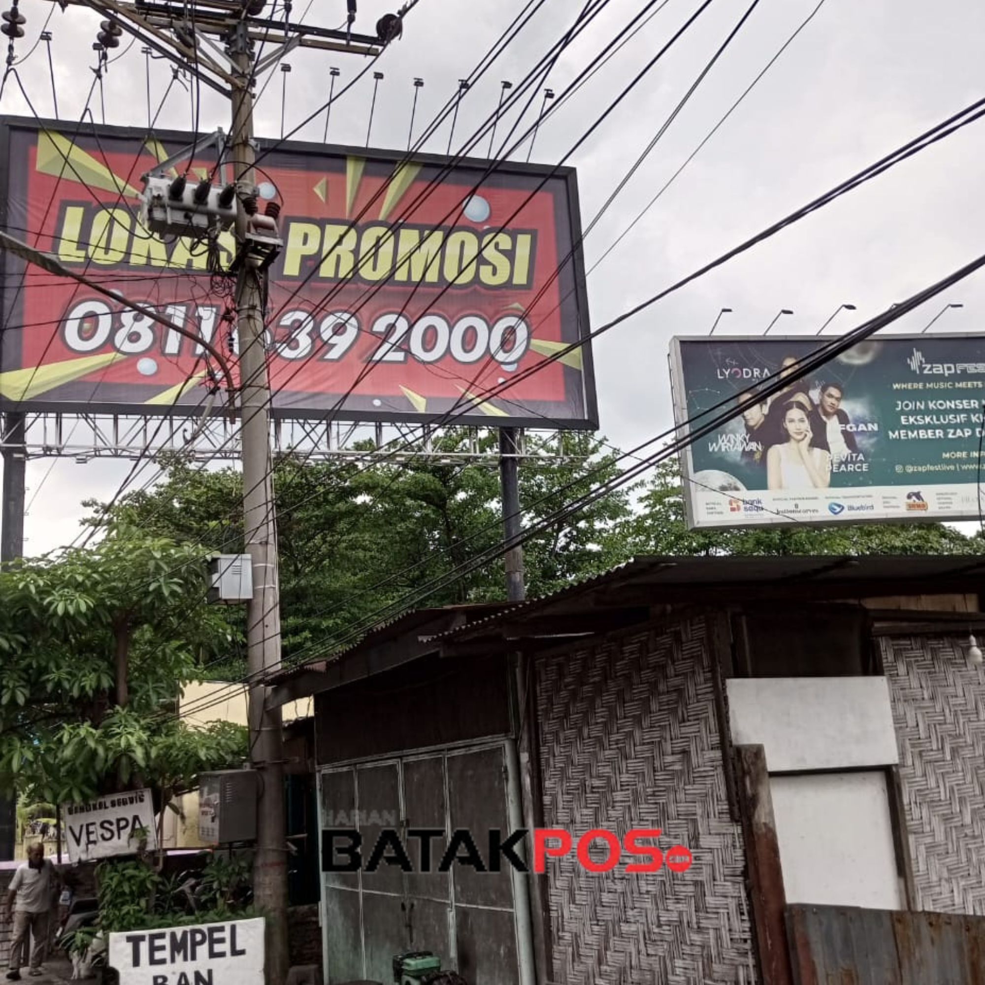 Papan Reklame Raksasa di Jalan Guru Patimpus diduga tidak memiliki izin.(harianbatakpos).
