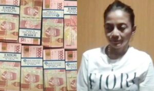 PENGEDAR UANG PALSU (Tribunews.com)