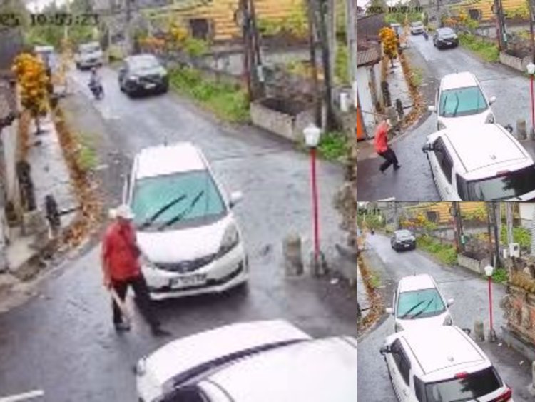 Perang Ego Dua Pemobil di Tabanan Bali, Aksi Bapak Berkaos Merah dengan Sebilah Bambu Jadi Sorotan (kompas.com)